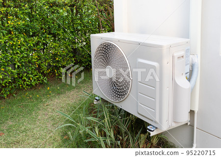 Air condition outdoor unit compressor install outside the house Air condition outdoor unit compressor install outside the house 95220715