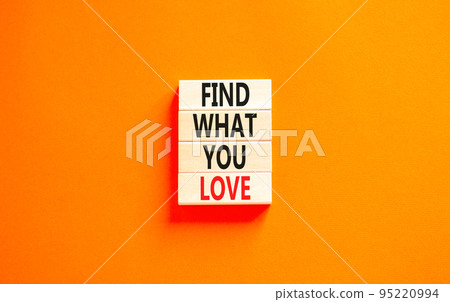 Find what you love symbol. Concept words Find what you love on wooden blocks. Beautiful orange table orange background. Business, psychological find what you love concept. Copy space. 95220994
