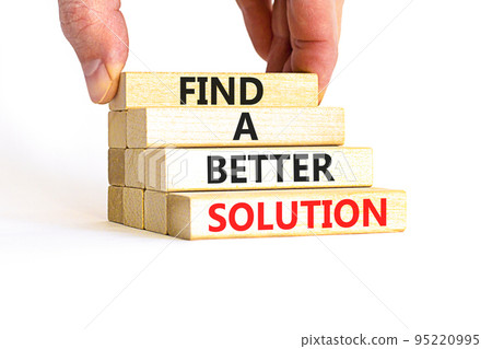 Find a better solution symbol. Concept words Find a better solution on wooden blocks. Beautiful white table white background. Businessman hand. Business find a better solution concept. Copy space. 95220995