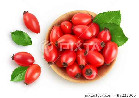 Rose hip in wooden bowl isolated on a white background with full depth of field. Top view. Flat lay Rose hip in wooden bowl isolated on a white background with full depth of field. Top view. Flat lay 95222909