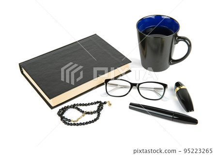 Book, cup of coffee, glasses, cosmetics and beads isolated on white background. Book, cup of coffee, glasses, cosmetics and beads isolated on white background. 95223265