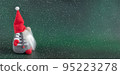 Christmas gnome in red hat holiday banner on dark green winter background 95223278