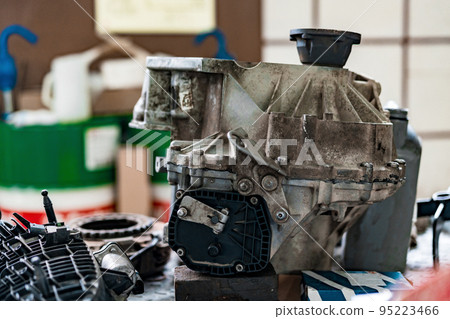 Disassembled automatic transmission from a car in a car service Disassembled automatic transmission from a car in a car service 95223466
