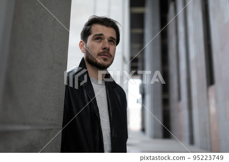 portrait of a middle-aged man experiencing apathy and indifference to everything that happens portrait of a middle-aged man experiencing apathy and indifference to everything that happens 95223749