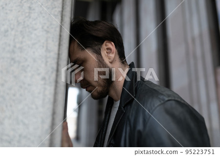 portrait of a man with signs of post-traumatic stress disorder portrait of a man with signs of post-traumatic stress disorder 95223751