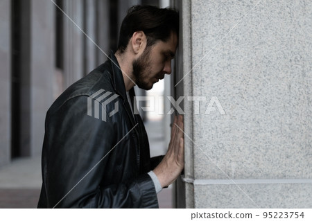 portrait of a middle-aged man with post-traumatic stress disorder 95223754