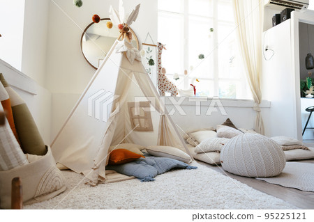 Stylish interior of children's room with hut 95225121