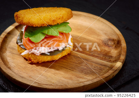 sushi menu with burger made from rice and smoked salmon, avocado, light cheese and nori 95226425