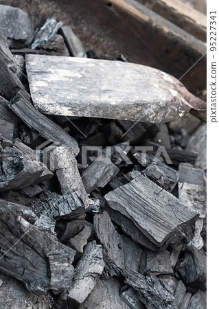 coal large pieces of rock piled in a heap close-up, fuel for heating coal large pieces of rock piled in a heap close-up, fuel for heating 95227341
