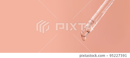 Closeup of pipette with face serum, hyaluronic acid on pink background. Cosmetics, healthcare concept. Dose of essential oill, retinol with air bubbles. Beauty product presentation, front view, macro Closeup of pipette with face serum, hyaluronic acid on pink background. Cosmetics, healthcare concept. Dose of essential oill, retinol with air bubbles. Beauty product presentation, front view, macro 95227391