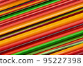 abstract pattern multicolored with bright lines yellow and red stripes oblique close-up 95227398
