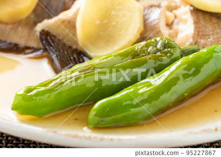 Close-up of Shishito served with boiled flounder. Close-up of Shishito served with boiled flounder. 95227867