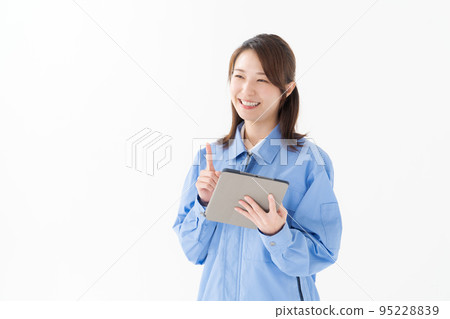 Women wearing work clothes Women wearing work clothes 95228839