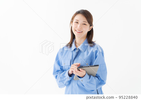Women wearing work clothes Women wearing work clothes 95228840
