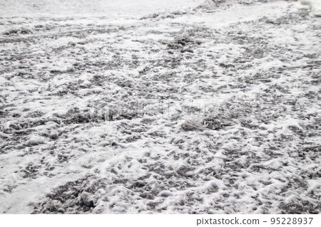 The pattern of the sandy beach when the waves pull The pattern of the sandy beach when the waves pull 95228937