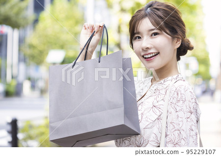 A young woman shopping A young woman shopping 95229107