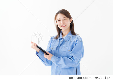 Women wearing work clothes Women wearing work clothes 95229142