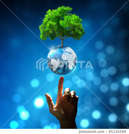 Hand pointing growing tree on crystal ball with technological convergence blue background. Innovative technology, Nature technology interaction, Environmental friendly, IT Ethics, and Ecosystem concep 95230389