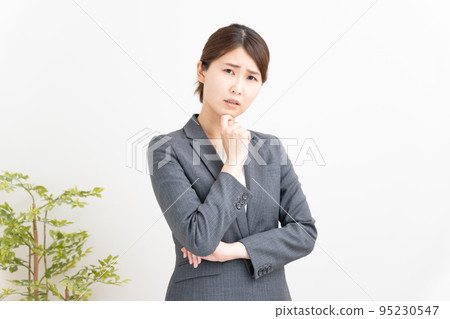 Worried business woman Worried business woman 95230547