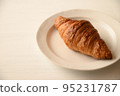 Croissant white background copy space 95231787