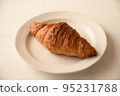 Croissant white background 95231788