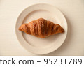Croissant white background true bird's eye view 95231789