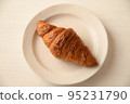Croissant white background slanted 95231790
