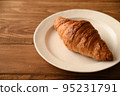 Croissant table background copy space 95231791