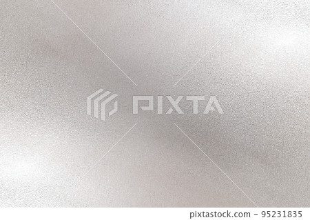 Glowing silver foil metal sheet wall with copy space, abstract metallic texture background 95231835