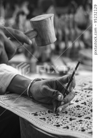 craft artist making traditional buffalo leather carving art in indonesia craft artist making traditional buffalo leather carving art in indonesia 95232129