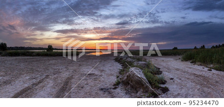 panorama of a salt lake on steppe near the Azov sea on sunset panorama of a salt lake on steppe near the Azov sea on sunset 95234470