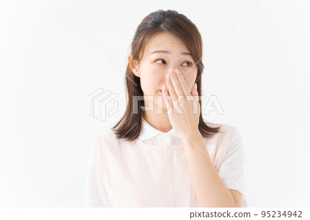 Female staff in apron 95234942