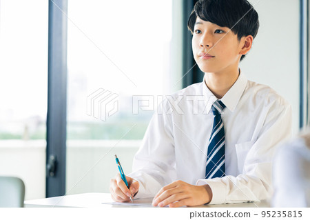 Male junior high school student studying Male junior high school student studying 95235815