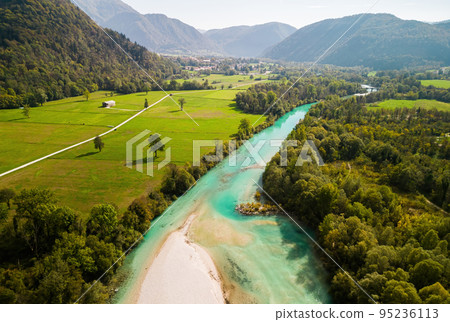 Aerial view of Mesmerizing turquoise colored river Soca. Aerial view of Mesmerizing turquoise colored river Soca. 95236113