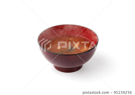 Steaming red miso soup white background Steaming red miso soup white background 95239256