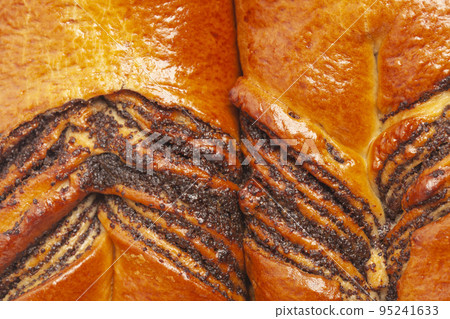 The texture of poppy seed strudel 95241633
