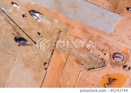 Vertical tamrock pile foundation drilling machine at construction site ground improvement techniques, piling contractors under columns high pressure pour pumping concrete sweat earth 95243744