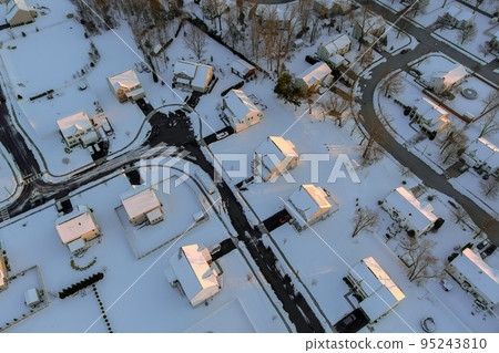 Small American town located in New Jersey, where residential buildings covered in snow as result of severe snow storm that recently hit the region. Small American town located in New Jersey, where residential buildings covered in snow as result of severe snow storm that recently hit the region. 95243810