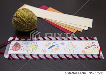 bookmark for books, Art and handswork for children with woolen threads 95247598
