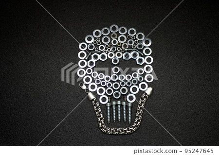 Metal art. Skull made by screw nuts, washers and bolts Metal art. Skull made by screw nuts, washers and bolts 95247645