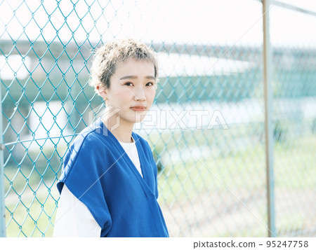 fence and woman 95247758
