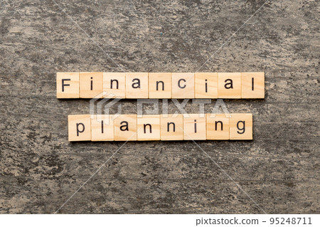 financial planning word written on wood block. financial planning text on cement table for your desing, concept financial planning word written on wood block. financial planning text on cement table for your desing, concept 95248711