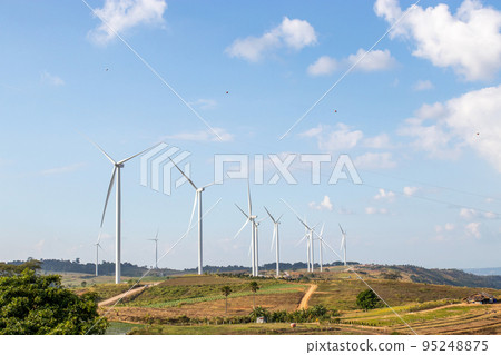 Wind turbine generate electricity with blue sky at Khao Kho Thailand.. 95248875