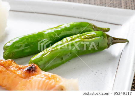 Shishito served with grilled fish. Shishito served with grilled fish. 95249117