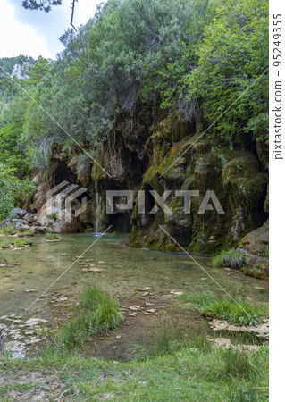 The spring of river Cuervo (Nacimiento del Rio Cuervo) in Cuenca, Castilla La Mancha, Spain 95249355