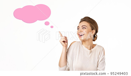 smiling young beautiful woman pointing up smiling young beautiful woman pointing up 95249403