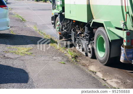 Street sweeper cleaning the road Street sweeper cleaning the road 95250888