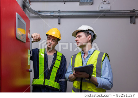 Engineer or technician work checking Fire suppression system and fire equipment. 95251157