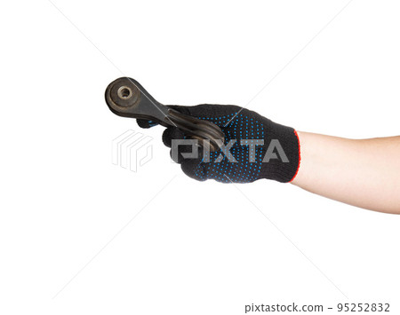 Car spare part with suspension, stabilizer bar in the hand of a car mechanic on a white background, isolate. Close-up Car spare part with suspension, stabilizer bar in the hand of a car mechanic on a white background, isolate. Close-up 95252832
