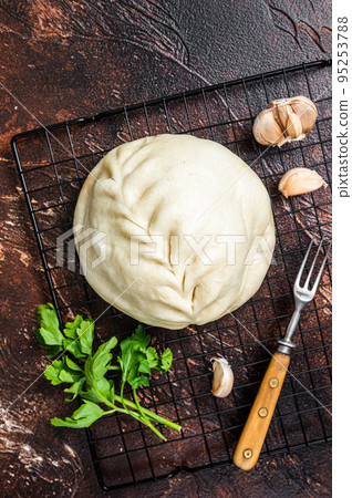 Pyan-se, Pyanse - Traditional Korean steamed pie bun with vegetable and meat. Dark background. Top view 95253788
